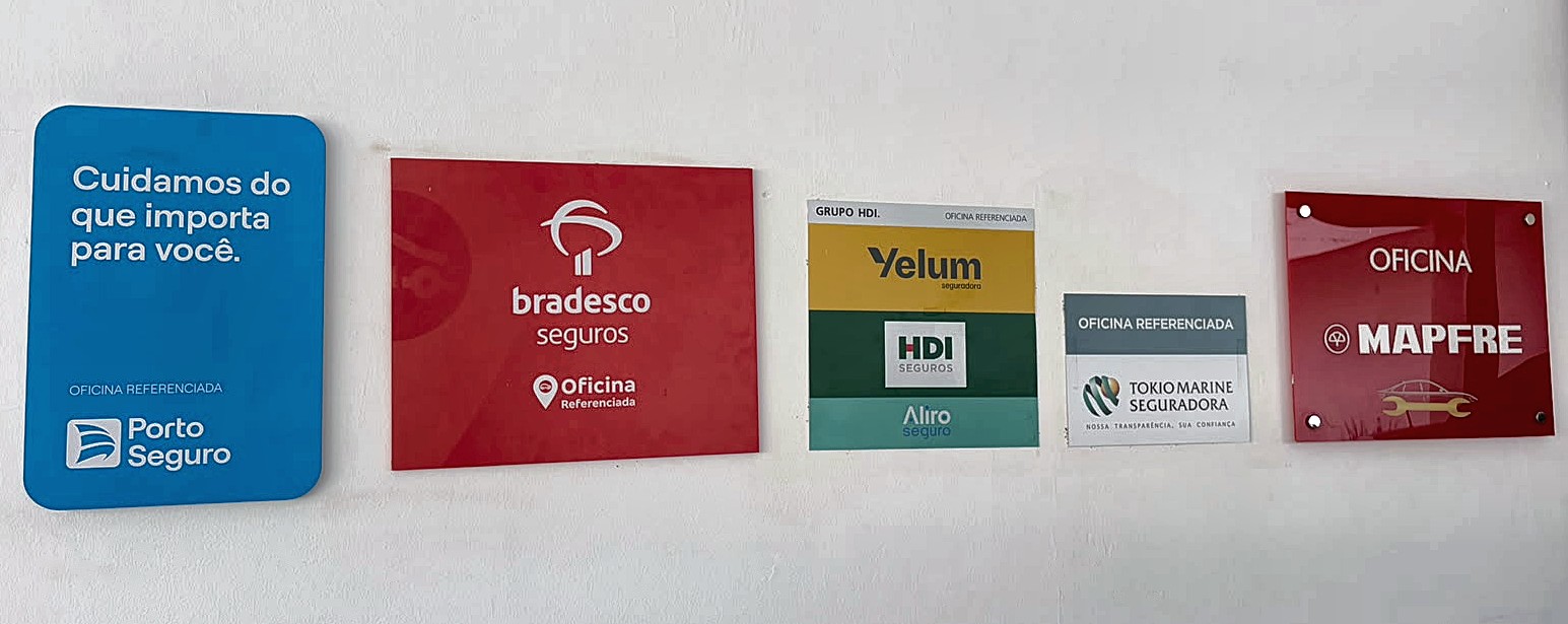 Placas de oficina referenciada das seguradoras Porto Seguro, Bradesco Seguros, Yelum, HDI, Aliro, Tokio Marine e Mapfre